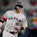 Japan third baseman Munetaka Murakami (55) runs the bases after hitting a home run.