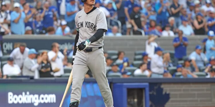 Cody Bellinger #35 of the New York Yankees reacts after he strikes out swinging during the fourth inning against the Blue Jays.