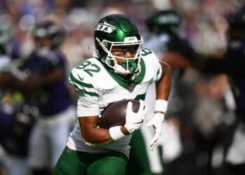New York Jets wide receiver Arian Smith (82) runs with the football.