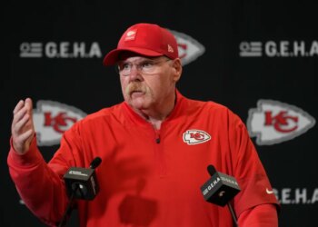 Kansas City Chiefs head coach Andy Reid talks to reporters.