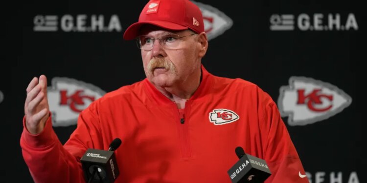 Kansas City Chiefs head coach Andy Reid talks to reporters.