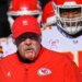 Andy Reid walks onto the field with the Chiefs before their game against the Titans on Dec. 21, 2025.