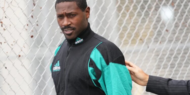 Former NFL star wide receiver Antonio Brown walks after being released from the Turner Guilford Knight Correctional Center, Nov. 13, 2025, in Miami.