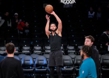 Brooklyn Nets guard Ben Simmons warms up before the game.