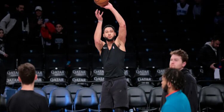 Brooklyn Nets guard Ben Simmons warms up before the game.