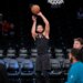 Brooklyn Nets guard Ben Simmons warms up before the game.