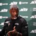 New York Jets head coach Aaron Glenn speaks in a press conference after an NFL football game against the Jacksonville Jaguars, Sunday, Dec. 14, 2025, in Jacksonville, Fla.