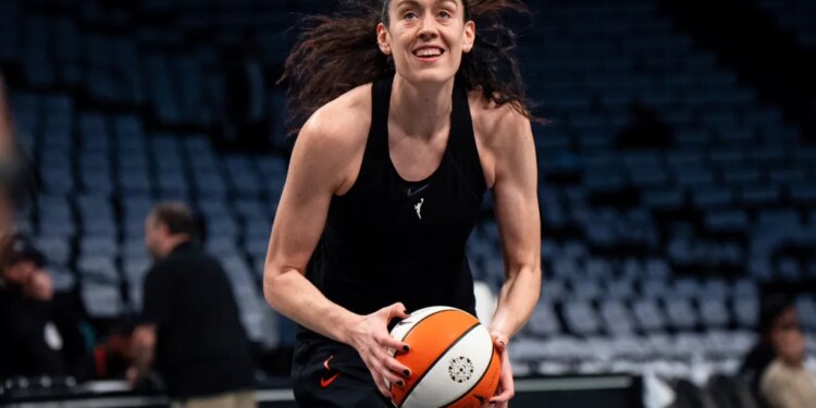 Breanna Stewart of the New York Liberty warms up with a basketball.