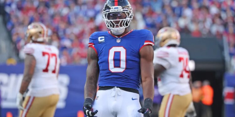 San Francisco 49ers Vs. New York Giants at MetLife Stadium: Brian Burns #0 of the New York Giants reacts on the field after a third down play during the third quarter.
