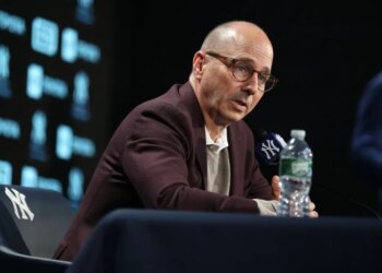 New York Yankees GM Brian Cashman speaking at a press conference.