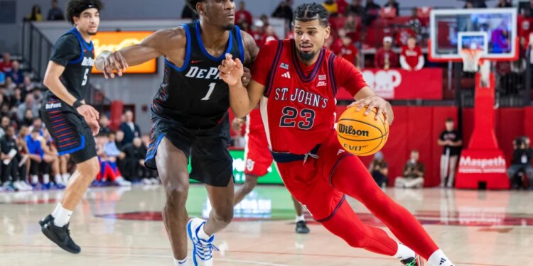 Bryce Hopkins #23 of the St. John's Red Storm drives to the basket as Kaleb Banks #1 of the DePaul Blue Demons gives chase.Bryce Hopkins #23 of the St. John's Red Storm drives to the basket as Kaleb Banks #1 of the DePaul Blue Demons gives chase
