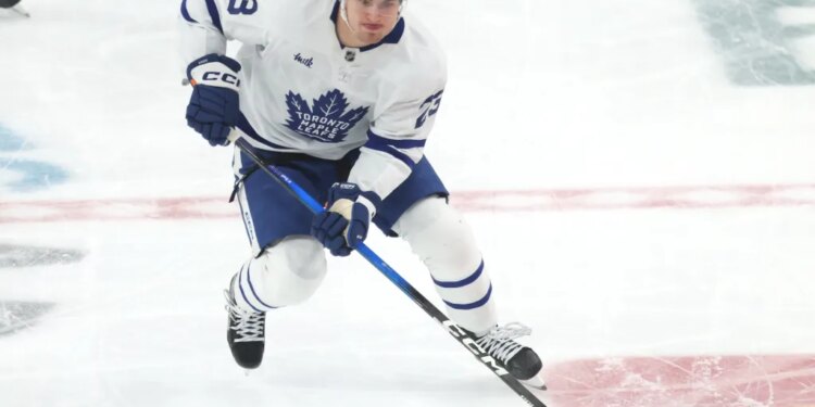 Toronto Maple Leafs left wing Matthew Knies (23) skates with the puck.