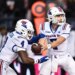 Louisiana Tech Bulldogs running back Clay Thevenin (4) takes the hand off from quarterback Evan Bullock (7).