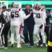 New England Patriots defensive tackle Christian Barmore (90) argues with his coaching staff.
