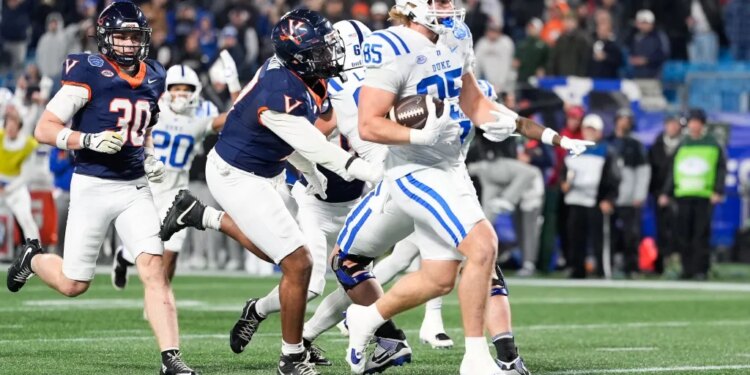 Jeremiah Hasley makes a 1-yard touchdown catch in overtime to lead Duke to a 27-20 win over Virginia in the ACC Championship on Dec. 6, 2025.