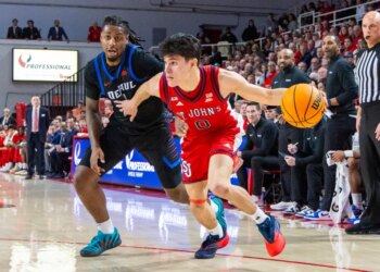 Dylan Darling of the St. John's Red Storm drives to the basket during the first half at Carnesecca Arena, Tuesday, Dec. 16, 2025,