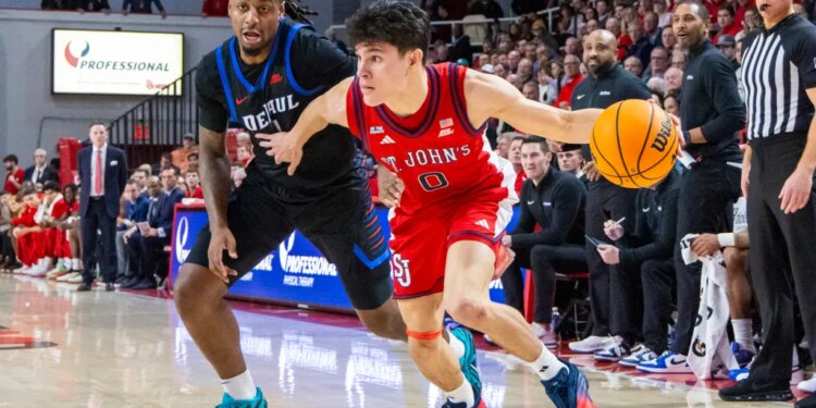 Dylan Darling of the St. John's Red Storm drives to the basket during the first half at Carnesecca Arena, Tuesday, Dec. 16, 2025,