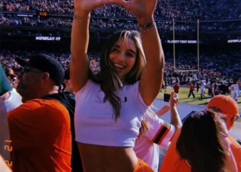 Abella Danger celebrates the Hurricanes' win over Texas A&M in the CFP.