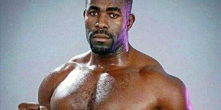 UFC Fighter Geronimo Dos Santos posing with clenched fists.