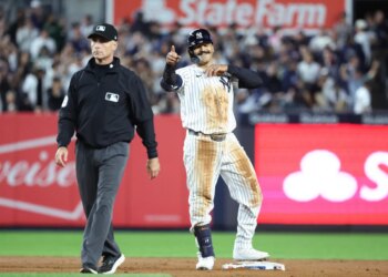 Trent Grisham #12 of the New York Yankees reacts after he hits a double during the 7th inning. The New York Yankees defeat the Boston Red Sox 4-3.