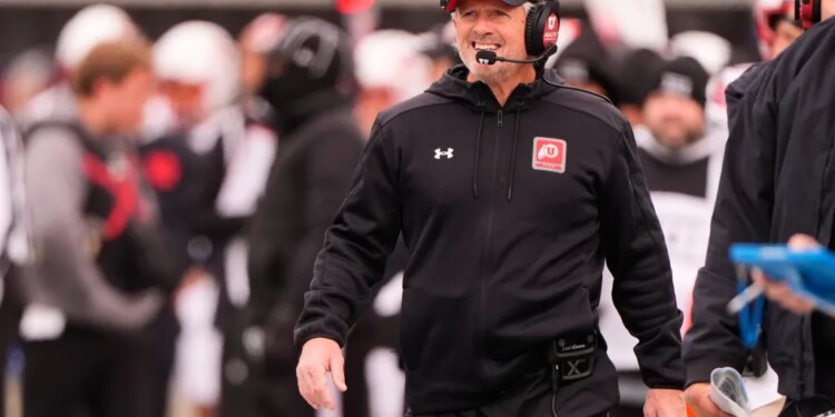 Utah head coach Kyle Whittingham on the sideline during a football game.