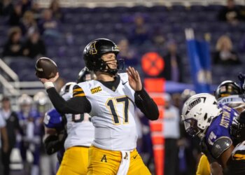 Appalachian State quarterback JJ Kohl (17) looks to pass against James Madison.