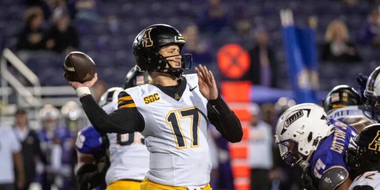 Appalachian State quarterback JJ Kohl (17) looks to pass against James Madison.