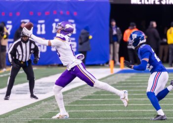 Wide receiver Justin Jefferson #18 of the Minnesota Vikings completes a reception during the second half at MetLife Stadium.