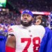 Andrew Thomas #78 of the New York Giants reacts on the sideline during the second half at Gillette Stadium, Monday, Dec.. 1, 2025.