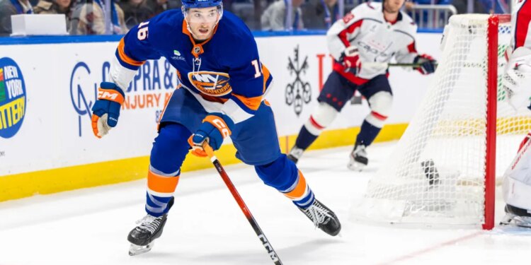 Marc Gatcomb #16 of the New York Islanders skates around the back of the net during the first period at UBS Arena, Saturday, Oct. 11, 2025.