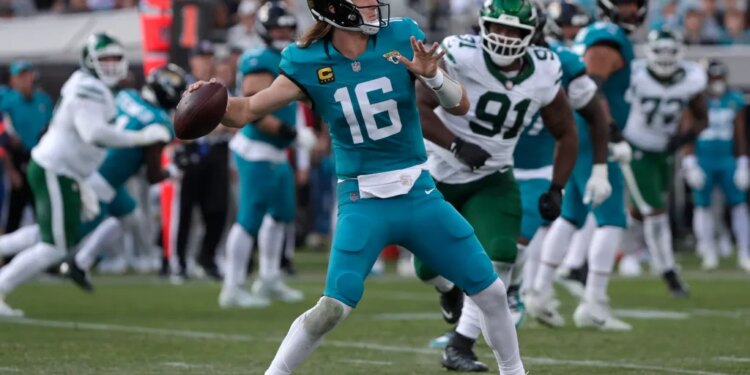 Jacksonville Jaguars quarterback Trevor Lawrence (16) throws the ball during the third quarter against the New York Jets.