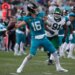 Jacksonville Jaguars quarterback Trevor Lawrence (16) throws the ball during the third quarter against the New York Jets.