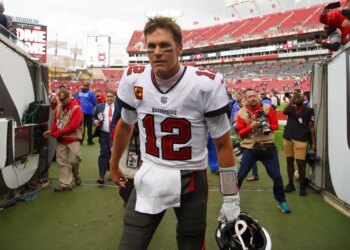 Tampa Bay Buccaneers quarterback Tom Brady (12) leaves the field after beating the Philadelphia Eagles 31-15 on Sunday, January16, 2022 in Tampa.