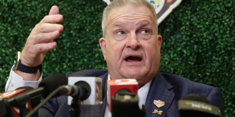 Michigan interim head coach Biff Poggi answers a question during an NCAA college football Citrus Bowl news conference in Winter Park, Fla., Monday, Dec. 15, 2025.