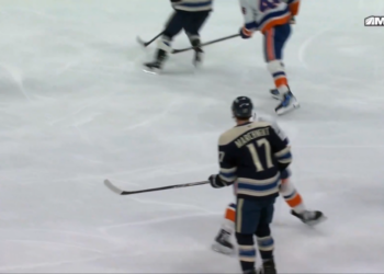 Mat Barzal winds up his stick to swing at Mason Marchment during a game on Sunday.