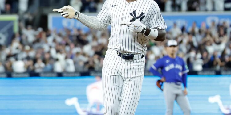 New York Yankees second baseman Jazz Chisholm Jr. reacts as he rounds the bases on his solo home run to give the Yankees the lead during the fifth inning of Game three of the ALDS against the Toronto Blue Jays in the Bronx, New York, October 07 2025.
