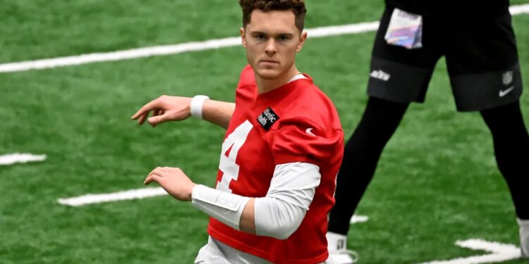 Jets quarterback Brady Cook (4) stretches at practice in Florham Park, NJ.