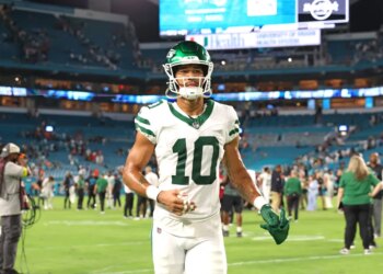 Allen Lazard #10 of the New York Jets walks off the field.