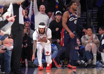 New York Knicks guard Jordan Clarkson #00 reacts after he hits a three-point shot during the fourth quarter.
