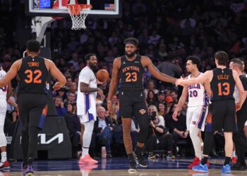 New York Knicks center Mitchell Robinson #23 is greeted by New York Knicks guard Tyler Kolek #13 after being fouled during the second quarter.