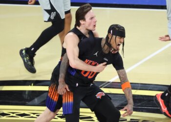 A jubilant Tyler Kolek (left) congratulates Jordan Clarkson for hitting a key 3-pointer  in the fourth quarter of the Knicks' 124-113 NBA Cup tourney-clinching win over the Spurs in Las Vegas on Dec. 16, 2025.