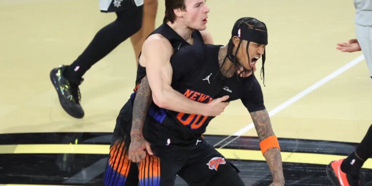A jubilant Tyler Kolek (left) congratulates Jordan Clarkson for hitting a key 3-pointer in the fourth quarter of the Knicks' 124-113 NBA Cup tourney-clinching win over the Spurs in Las Vegas on Dec. 16, 2025.