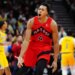 Scottie Barnes of the Toronto Raptors celebrating after a basket against the Los Angeles Lakers.