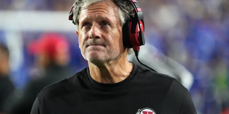 Utah head coach Kyle Whittingham looks at the scoreboard.