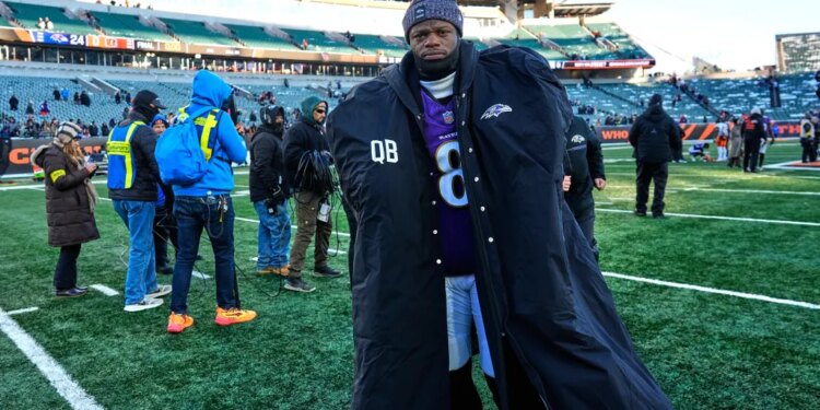 Baltimore Ravens quarterback Lamar Jackson (8) walks off the field after a win against the Cincinnati Bengals.