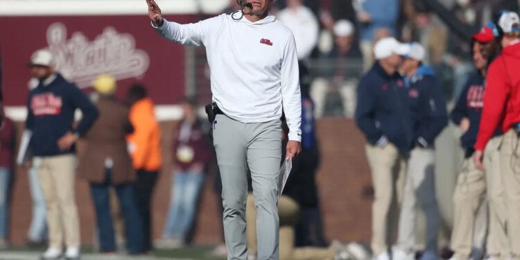 Mississippi Rebels head coach Lane Kiffin on the sideline.