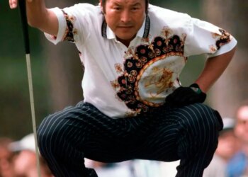 Japan's Jumbo Ozaki lines up his putt on the first green during final round the Masters at the Augusta National Golf Club in Augusta, Ga., April 13, 1997.