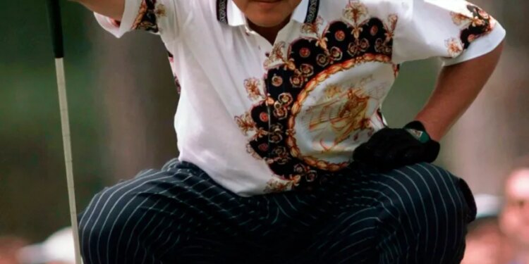 Japan's Jumbo Ozaki lines up his putt on the first green during final round the Masters at the Augusta National Golf Club in Augusta, Ga., April 13, 1997.