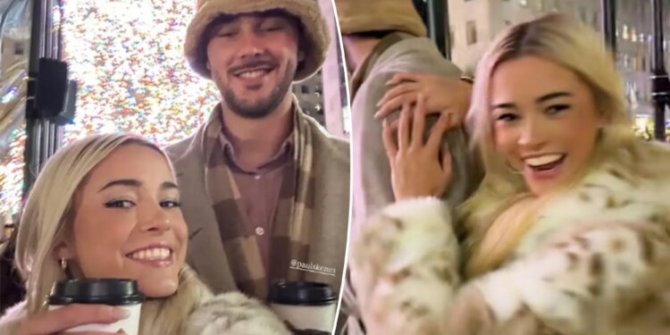 Livvy Dunne and Paul Skenes cozy up by Rockefeller Center tree