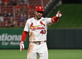 St. Louis Cardinals first baseman Willson Contreras (40) celebrates after hitting a RBI single against the Cincinnati Reds in the sixth inning at Busch Stadium.